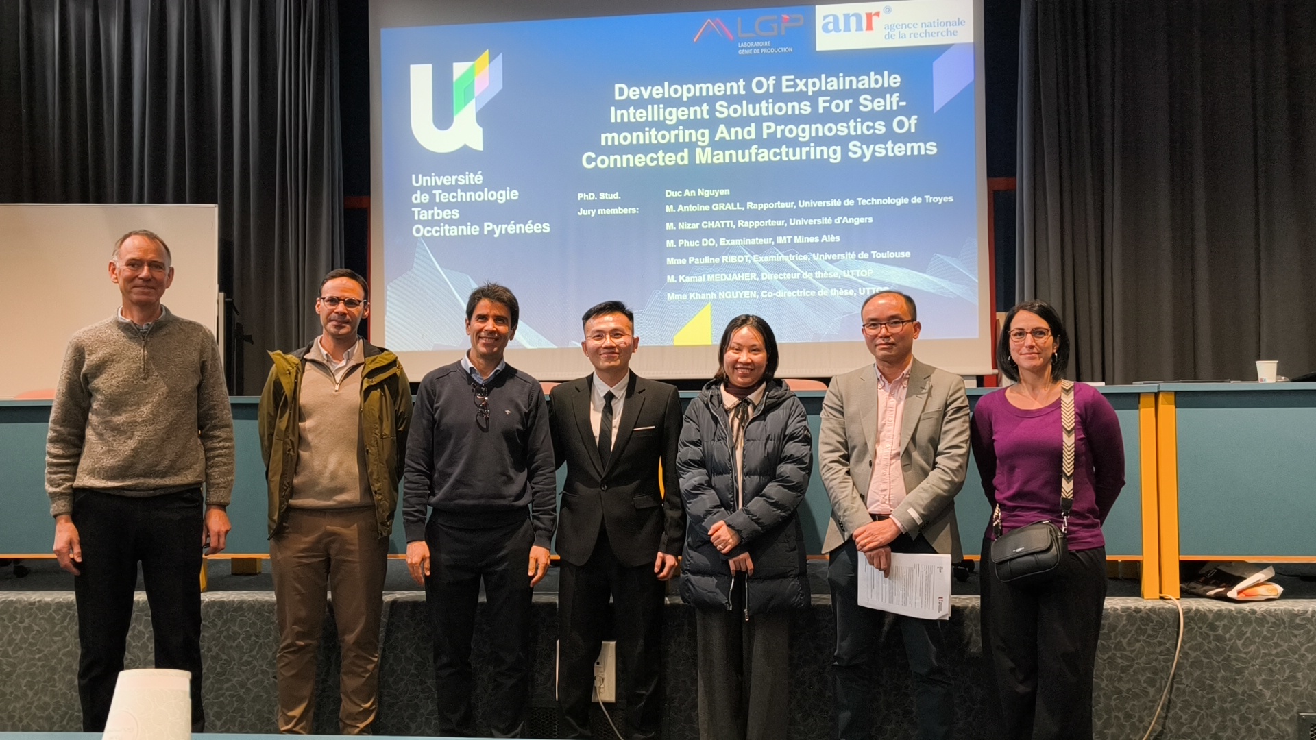 Jury members and the candidate during the defense presentation